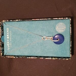 Lucky Brand blue circle pendant on small-dogchain style necklace